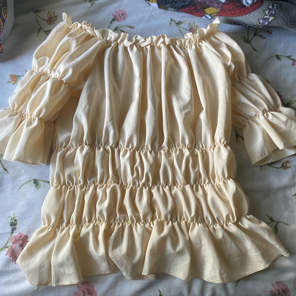 ruffle off the shoulder creme top